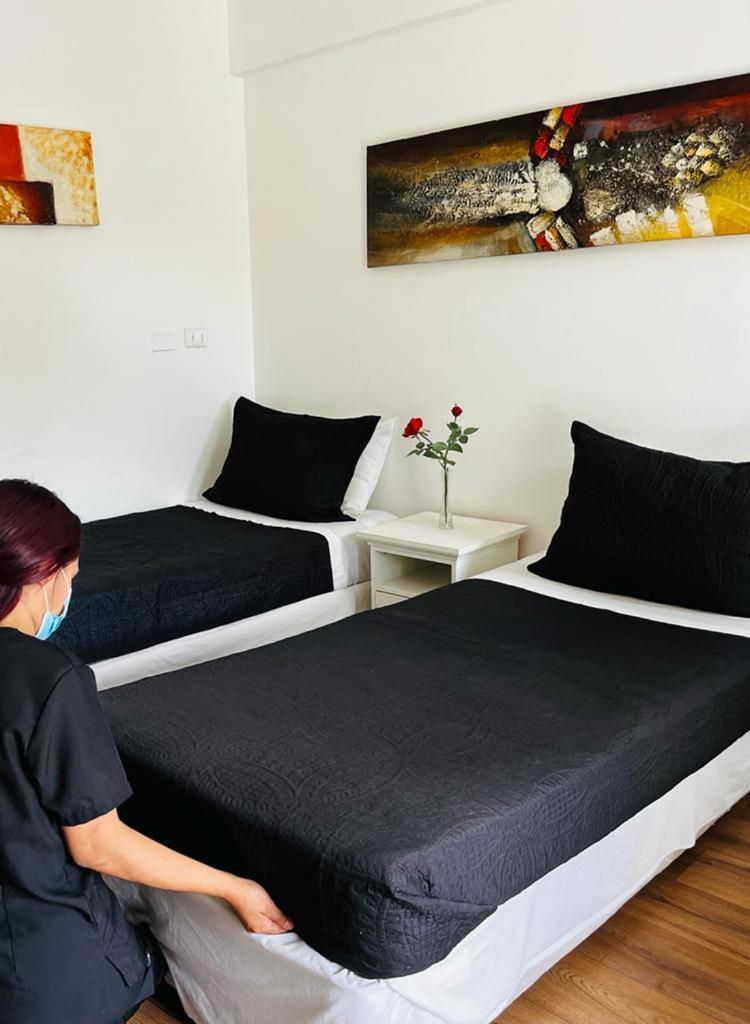 Quarto com 2 Camas de Solteiro